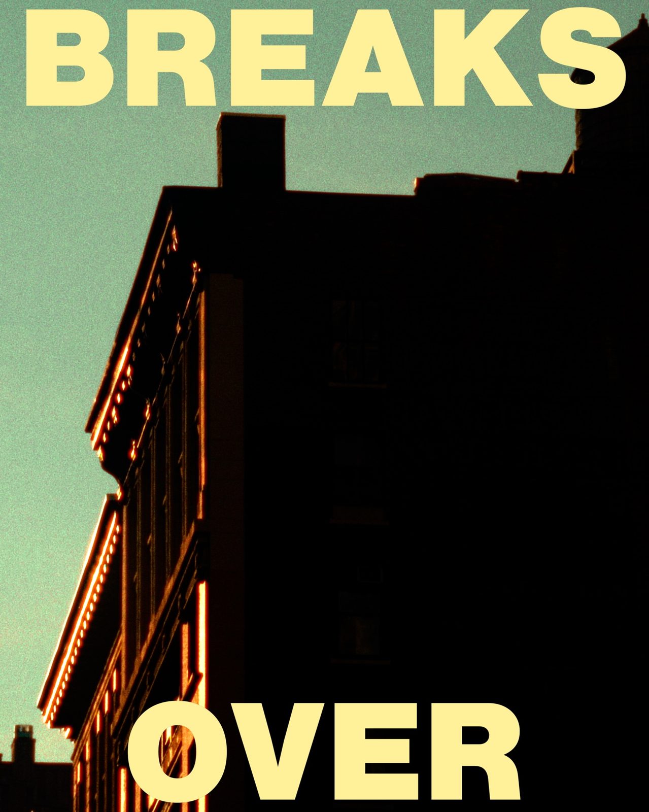 NYC building silhouette with teal sky